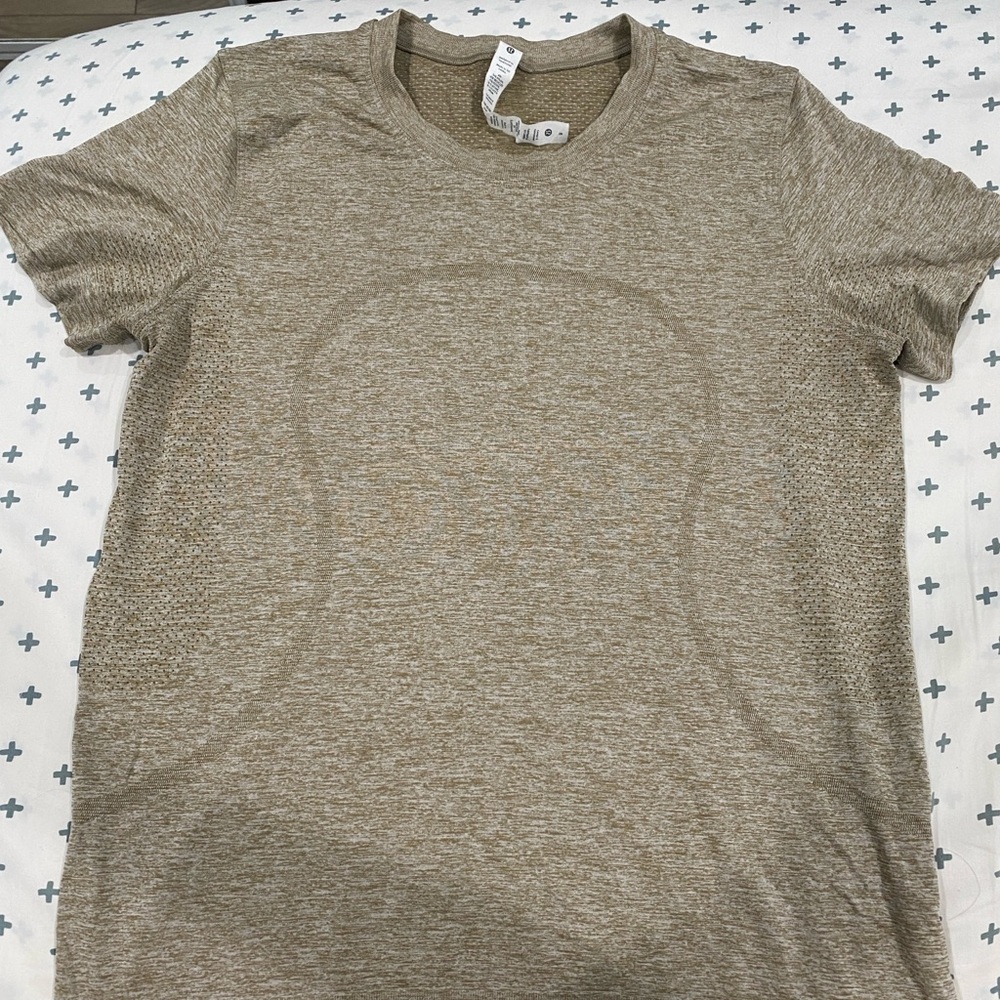 Lululemon athletic top tan color size 8 Medium/Large?